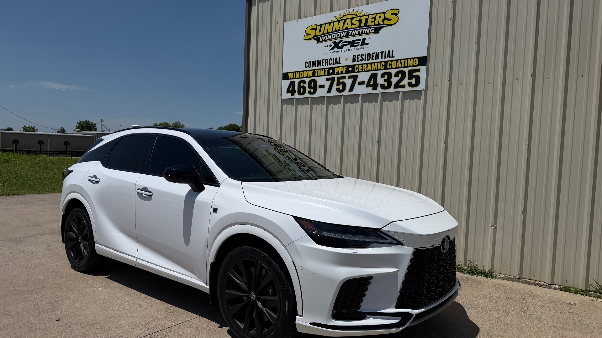 Lexus RX outside Sunmasters Rockwall shop